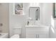 Simple bathroom with gray tile and white vanity at 2048 Chicago Nw Ave, Atlanta, GA 30314