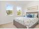 Bedroom with wood bed frame and light decor at 2048 Chicago Nw Ave, Atlanta, GA 30314