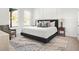 Spacious bedroom with king-size bed and sitting area at 2048 Chicago Nw Ave, Atlanta, GA 30314
