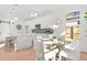 Kitchen dining area with glass table and four chairs at 2048 Chicago Nw Ave, Atlanta, GA 30314