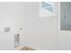 Simple laundry room with hookups and window at 2048 Chicago Nw Ave, Atlanta, GA 30314