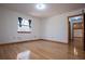 Bedroom featuring hardwood floors, a window and neutral walls at 4771 Cool Springs Rd, Winston, GA 30187