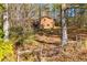 A house sits on a lot surrounded by trees at 4771 Cool Springs Rd, Winston, GA 30187