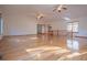 Spacious living room with vaulted ceiling, ceiling fans, and gleaming hardwood floors at 4771 Cool Springs Rd, Winston, GA 30187