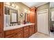 Primary bathroom features a double sink vanity with granite counters and a shower with a white curtain at 291 Miquel Jorge Ln, Canton, GA 30115