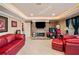 Open living space with a stone fireplace and a flatscreen TV at 291 Miquel Jorge Ln, Canton, GA 30115