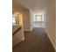 Hallway with carpet flooring and white trim and banister at 2260 Highridge Point Dr, Lithia Springs, GA 30122