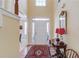 Bright entryway with hardwood floors, a rug, and a console table at 905 Fairview Club Cir, Dacula, GA 30019