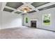 Spacious living room with fireplace and coffered ceiling at 4251 Matisse Ln, Fairburn, GA 30213