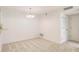 Simple dining room with carpeted floor and lighting fixture at 1302 Woodcliff Dr, Atlanta, GA 30350