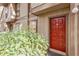 Exterior view showing the front entrance with a red door at 1302 Woodcliff Dr, Atlanta, GA 30350