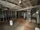 Unfinished basement with plumbing and HVAC systems at 2820 Arlington Rd, Atlanta, GA 30344