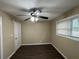 Cozy bedroom with a ceiling fan and hardwood floors at 2820 Arlington Rd, Atlanta, GA 30344