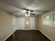 Spacious bedroom with double doors and a ceiling fan at 2820 Arlington Rd, Atlanta, GA 30344