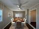 Dining room features a wood table with six chairs and a ceiling fan at 2053 Juanita St, Decatur, GA 30032
