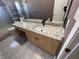 Bathroom featuring granite countertop, under mount sink, and modern fixtures at 1251 Marlton Chase Dr, Lawrenceville, GA 30044