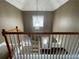 View from the upper level overlooking the entry, showcasing the home's spaciousness at 1251 Marlton Chase Dr, Lawrenceville, GA 30044