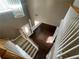 Foyer with hardwood floors, staircase, and chandelier at 1251 Marlton Chase Dr, Lawrenceville, GA 30044