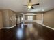 Open-concept living and dining area with hardwood floors and an abundance of natural light at 1251 Marlton Chase Dr, Lawrenceville, GA 30044