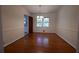 Classic dining room with hardwood floors, neutral walls, and chandelier at 2071 Carthage Rd, Tucker, GA 30084