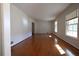 Bright living room with hardwood floors, natural light, and neutral walls at 2071 Carthage Rd, Tucker, GA 30084