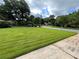 Expansive front yard, featuring a healthy green lawn at 2071 Carthage Rd, Tucker, GA 30084