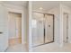 Bathroom featuring frameless shower and linen closet at 4039 Andover Cir, Mcdonough, GA 30252