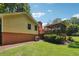 Ranch house with brick accents and screened porch at 9123 Thornton Blvd, Jonesboro, GA 30236