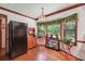 Bright kitchen with stainless steel refrigerator and natural light at 9123 Thornton Blvd, Jonesboro, GA 30236