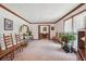 Spacious living room with natural light and classic wood trim at 9123 Thornton Blvd, Jonesboro, GA 30236