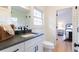 Modern bathroom with white vanity and gray countertop at 13130 Providence Rd, Milton, GA 30009