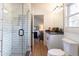 Clean bathroom with white subway tiles and a walk-in shower at 13130 Providence Rd, Milton, GA 30009