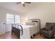 Cozy bedroom with metal bed frame and light walls at 13130 Providence Rd, Milton, GA 30009