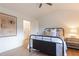 Simple bedroom with metal bed frame and light walls at 13130 Providence Rd, Milton, GA 30009