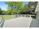 Spacious deck with white railings provides ample outdoor space at 13130 Providence Rd, Milton, GA 30009