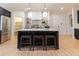 Kitchen island with seating, perfect for entertaining at 13130 Providence Rd, Milton, GA 30009