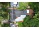 Aerial view showing house, backyard patio, and surrounding trees at 952 Lindbergh Ne Dr, Atlanta, GA 30324