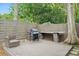 Private backyard deck with grill and seating area at 952 Lindbergh Ne Dr, Atlanta, GA 30324