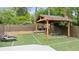 Backyard oasis with pergola, grill station, and lounge chairs at 952 Lindbergh Ne Dr, Atlanta, GA 30324