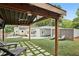 Relaxing backyard patio with pergola and lounge chairs at 952 Lindbergh Ne Dr, Atlanta, GA 30324