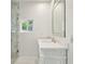 Modern bathroom with glass shower and white vanity at 952 Lindbergh Ne Dr, Atlanta, GA 30324