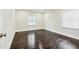 Spacious bedroom featuring hardwood floors and a window at 952 Lindbergh Ne Dr, Atlanta, GA 30324