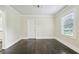 Empty bedroom featuring hardwood floors, neutral paint and natural light at 952 Lindbergh Ne Dr, Atlanta, GA 30324