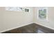 This bedroom features hardwood floors, neutral paint, and an abundance of natural light at 952 Lindbergh Ne Dr, Atlanta, GA 30324