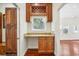 Butlers pantry with granite countertop and wood cabinets at 952 Lindbergh Ne Dr, Atlanta, GA 30324