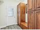 Bright entry with built-in bench and storage cabinets at 952 Lindbergh Ne Dr, Atlanta, GA 30324