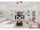 Bright living room featuring custom built-ins, modern furniture, and a decorative area rug at 952 Lindbergh Ne Dr, Atlanta, GA 30324