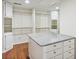 Large walk-in closet with ample shelving and granite island at 952 Lindbergh Ne Dr, Atlanta, GA 30324