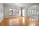 Bright dining room with hardwood floors and access to the kitchen at 3419 Concord Loop, Atlanta, GA 30349