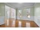 Hardwood floors and wainscoting in this spacious dining room at 3419 Concord Loop, Atlanta, GA 30349